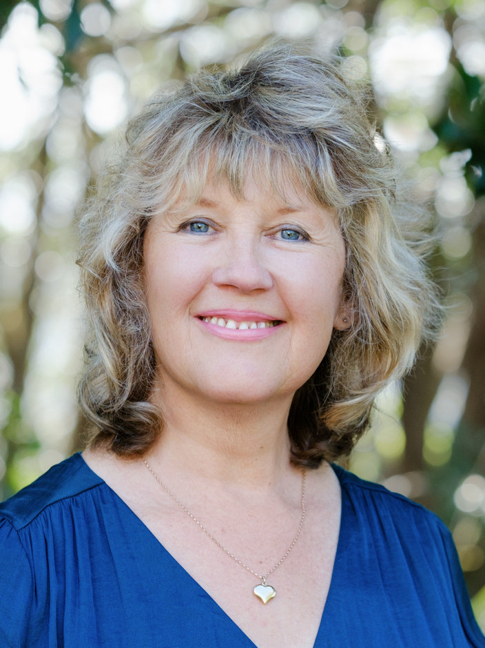 Professional image of Heather Todd, holistic counsellor passionate about helping people with trauma recovery, anxiety, depression, and relationship challenges.