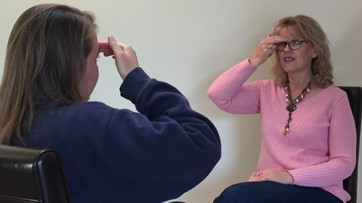 Holistic Counsellor Heather Todd engaged in a Clinical EFT session with a client. highlighting personalised emotional support